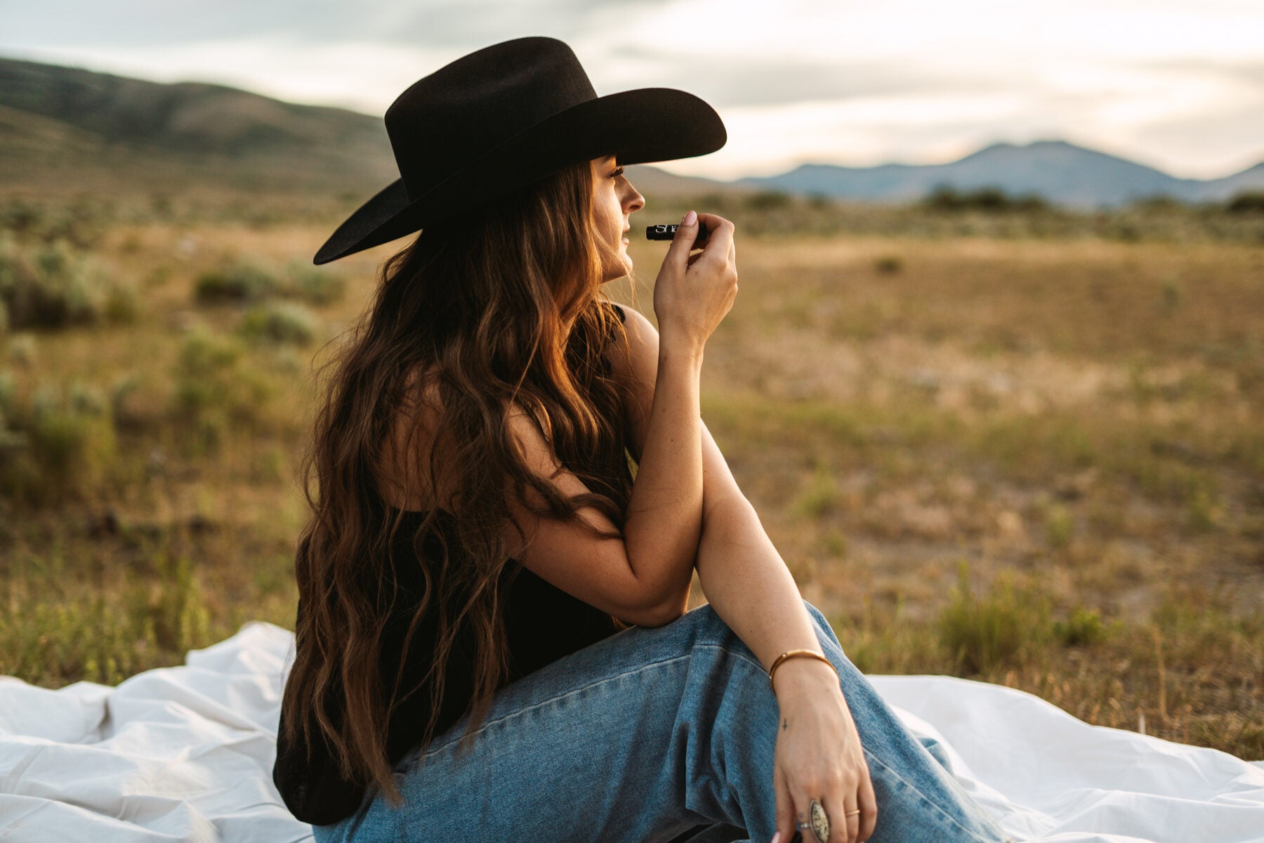 Applying Shaae balm outdoors in Idaho