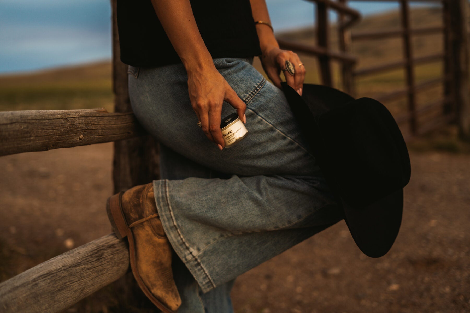 Sitting on a ranch fence in Southern Idaho